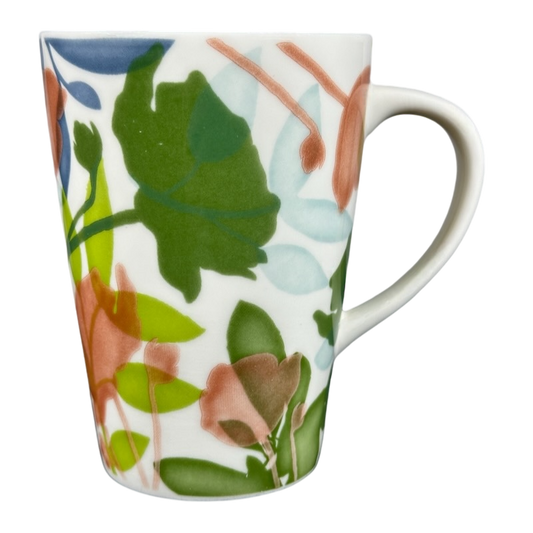 2009 Starbucks floral mug featuring vibrant botanical designs in green, pink, and blue hues