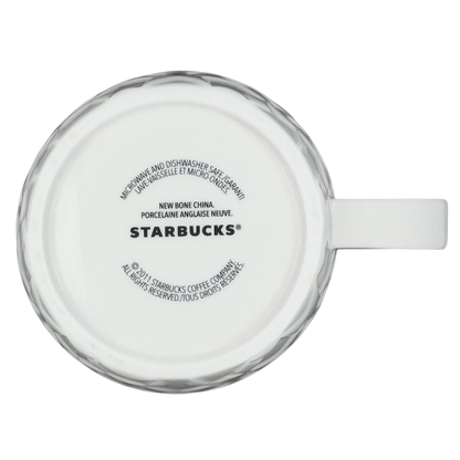 Bottom view of the 2011 Starbucks Embossed Stars collectible mug showcasing its logo and details