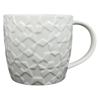 2011 Starbucks Embossed Stars collectible mug with a textured geometric design in white
