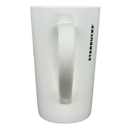 2011 vintage Starbucks 16 Grande mug white tall ceramic mug with vertical black Starbucks logo and handle on black background