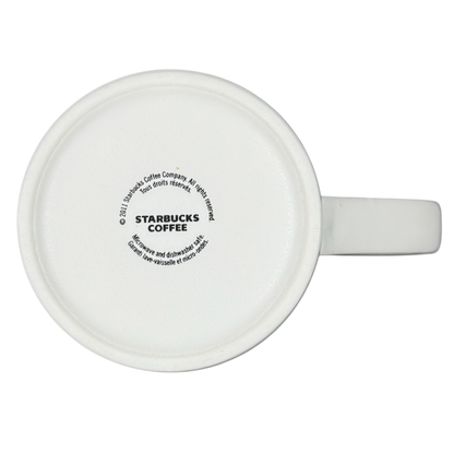 Bottom view of white 2011 vintage Starbucks 16 Grande mug showing Starbucks Coffee logo and handle