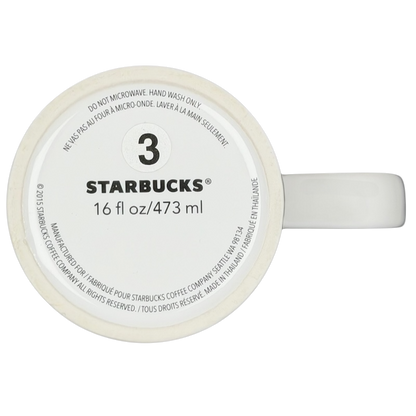 Bottom view of the 2015 Starbucks cat yarn collectible mug showing size and care instructions