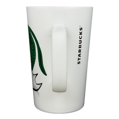 2015 Starbucks cat yarn collectible mug featuring a playful feline design on a white background
