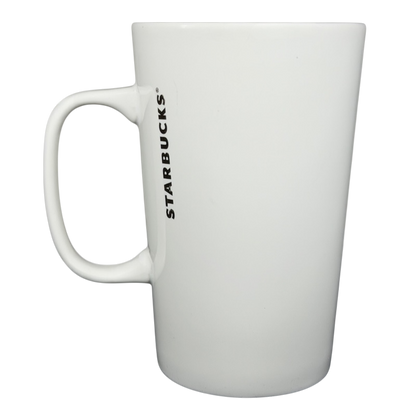 2015 Starbucks cat yarn collectible mug featuring a sleek white design and Starbucks logo