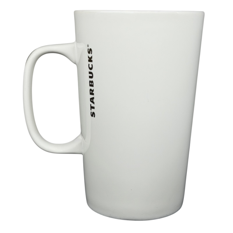 2015 Starbucks cat yarn collectible mug with a sleek white design and tall handle