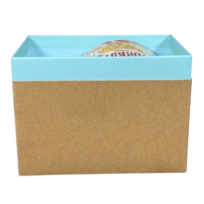 2018 Starbucks South Dakota Collectible mug partially visible inside blue and brown gift box