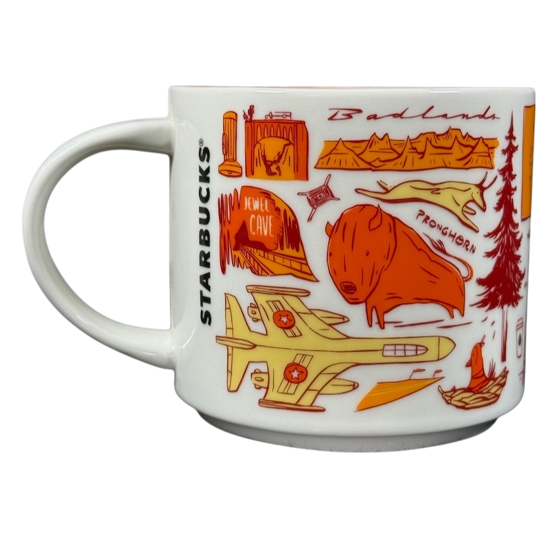 2018 Starbucks South Dakota Collectible mug featuring orange and red state-themed illustrations