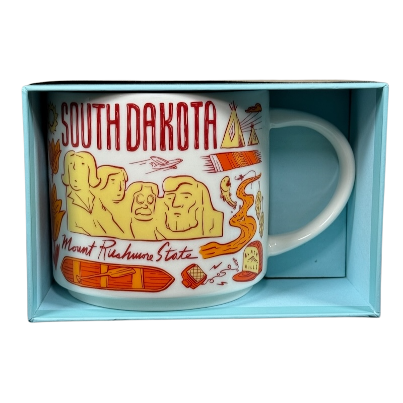 2018 Starbucks South Dakota Collectible mug featuring Mount Rushmore and local icons in a blue box