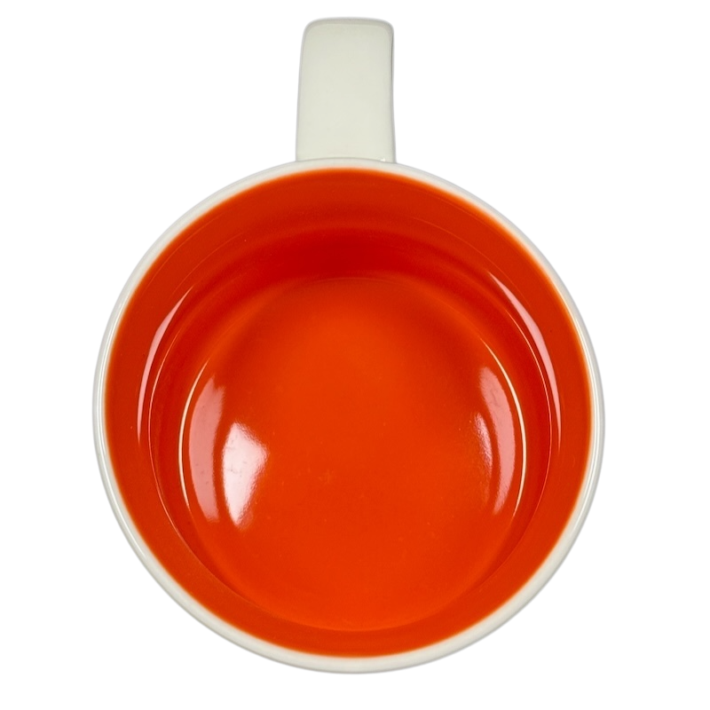 Top view of the 2018 Starbucks South Dakota Collectible mug with bright orange interior and white handle