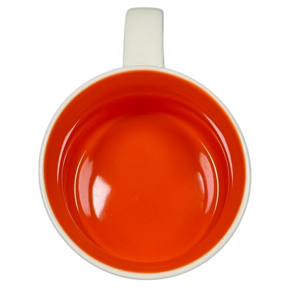 Top view of the 2018 Starbucks South Dakota Collectible mug with bright orange interior and white handle