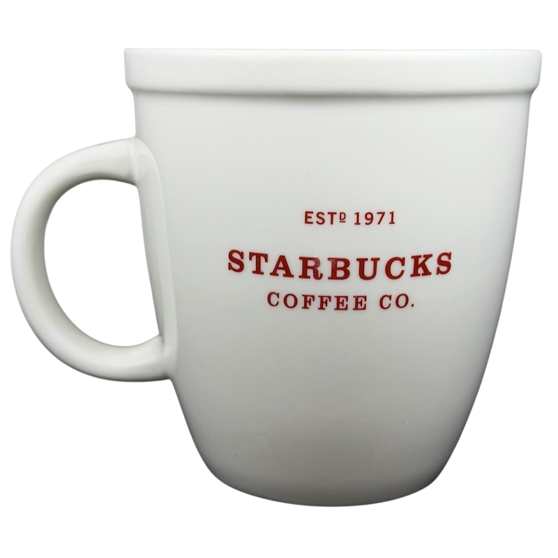 Starbucks Abbey 2007 red lettering holiday mug featuring a classic white design