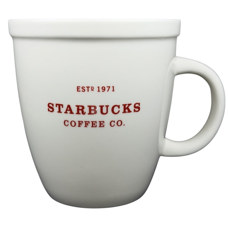 Starbucks Abbey 2007 red lettering holiday mug with classic white design and handle