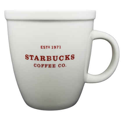 Starbucks Abbey 2007 red lettering holiday mug with classic white design and handle