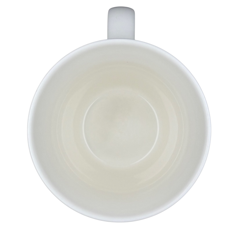 Inside view of the Starbucks Abbey 2007 red lettering holiday mug showcasing a smooth white finish