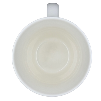 Inside view of the Starbucks Abbey 2007 red lettering holiday mug showcasing a smooth white finish