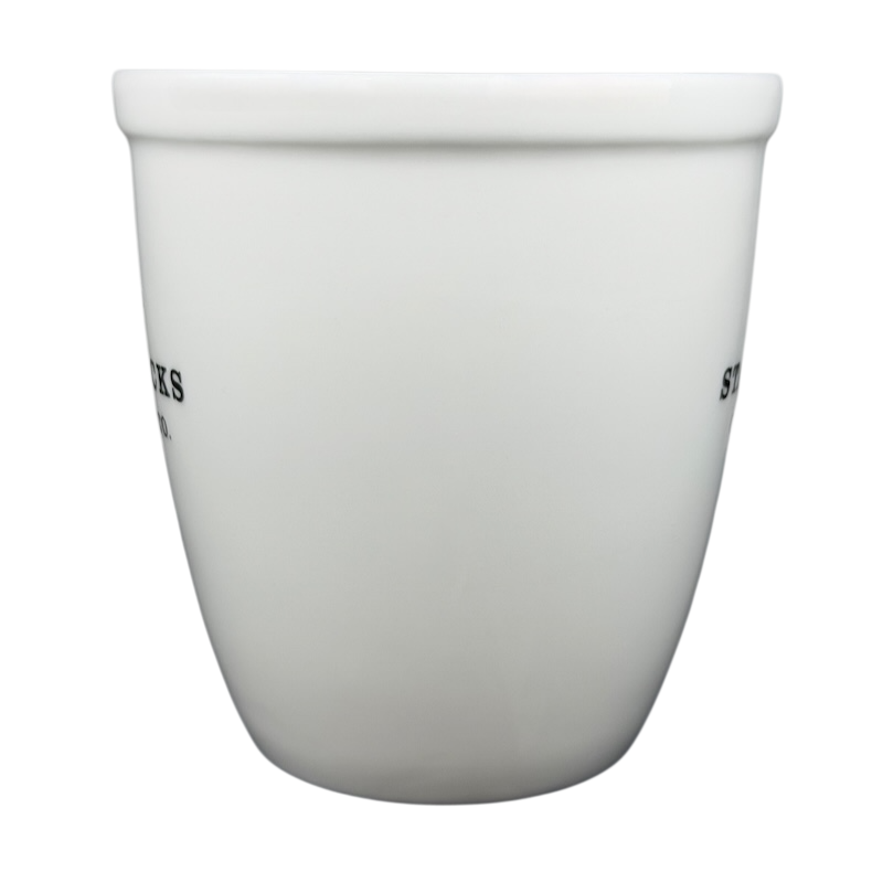 Starbucks Abbey ESTD 1971 New Bone China Mug 2009 with a sleek white design and classic branding