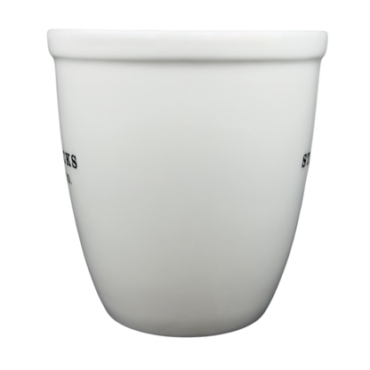 Starbucks Abbey ESTD 1971 New Bone China Mug 2009 with a sleek white design and classic branding
