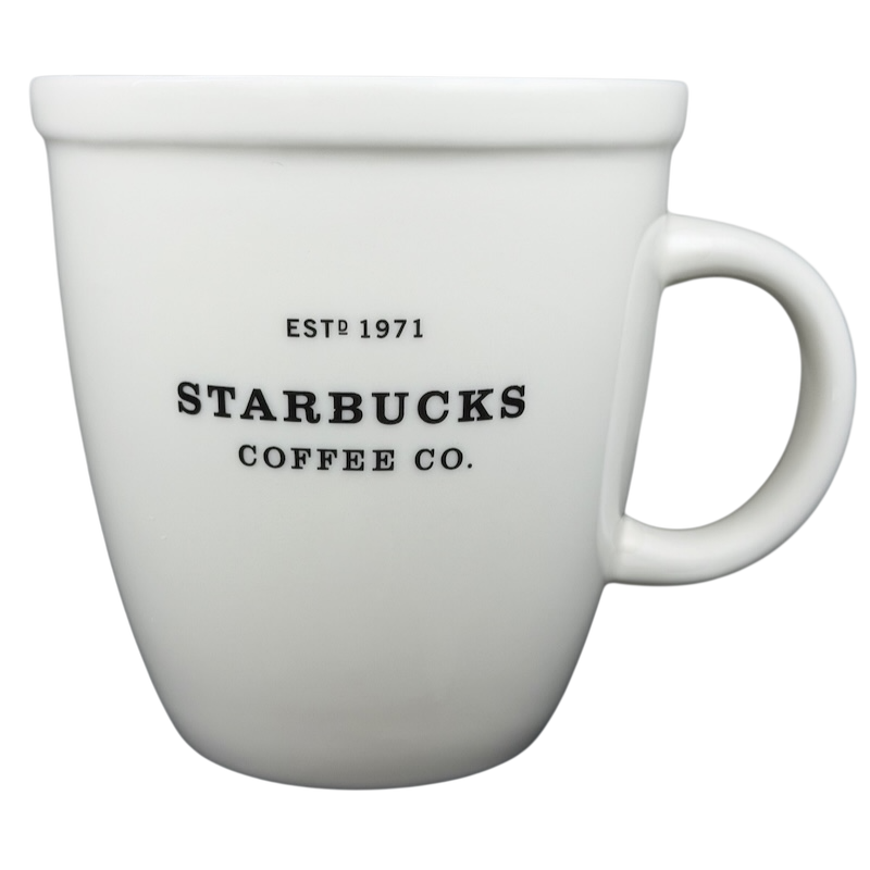 Starbucks Abbey ESTD 1971 New Bone China Mug 2009 with a smooth white finish and black lettering