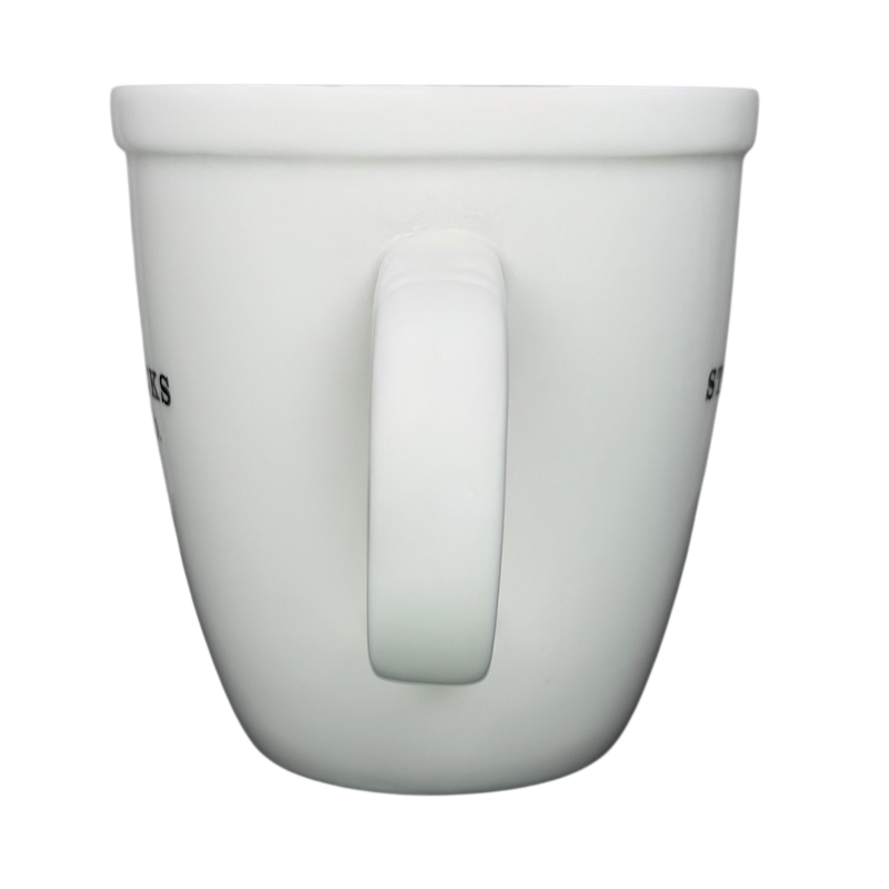 Starbucks Abbey ESTD 1971 New Bone China Mug 2009 featuring a classic white design with a sturdy handle