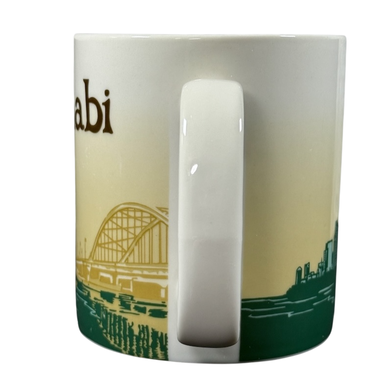 Abu Dhabi Starbucks mug 2014 with city skyline and bridge design in beige and green colors