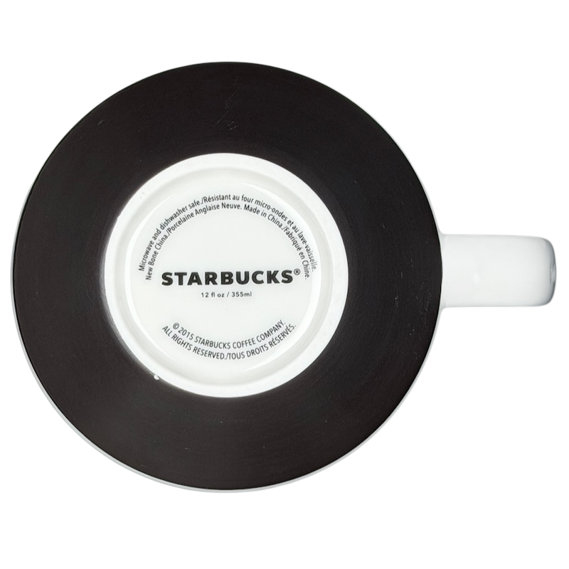 Bottom view of a Starbucks artisan heritage mug featuring a sleek black design and a Starbucks logo