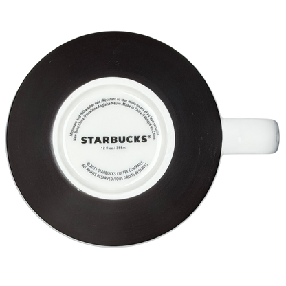 Bottom view of a Starbucks artisan heritage mug featuring a sleek black design and a Starbucks logo