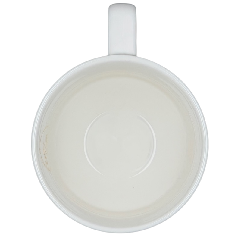 Inside view of the Starbucks artisan heritage mug showcasing its smooth ceramic finish.