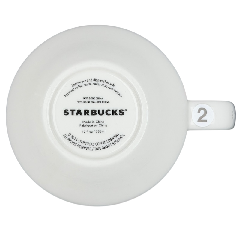 Underside of Starbucks Artisan Series collectible mug labeled with details and design for collectors