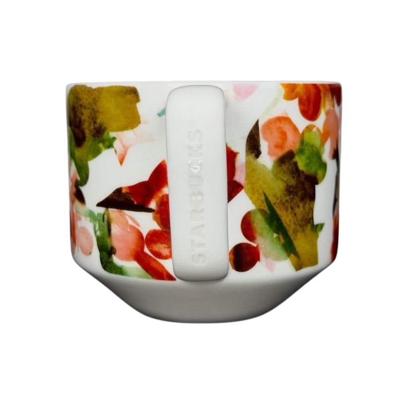 Starbucks Artisan Series collectible mug featuring vibrant floral patterns on a sleek white design