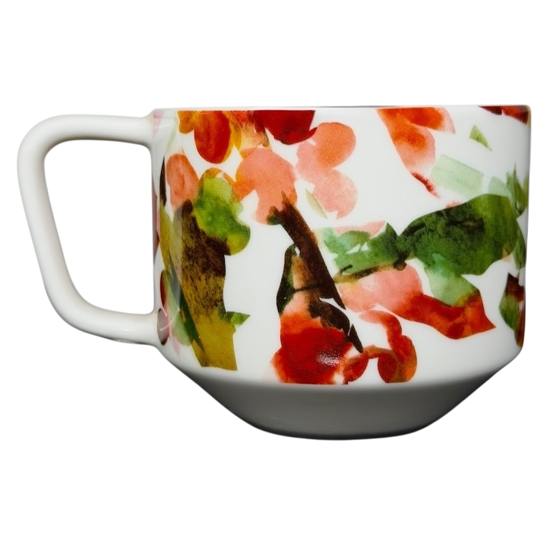 Starbucks Artisan Series collectible mug featuring a colorful floral design on a white background