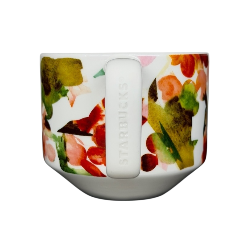 Starbucks Artisan Series collectible mug featuring a colorful floral design for coffee enthusiasts