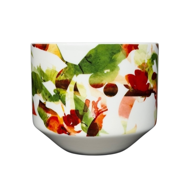 Starbucks Artisan Series collectible mug with a vibrant floral pattern and a glossy finish
