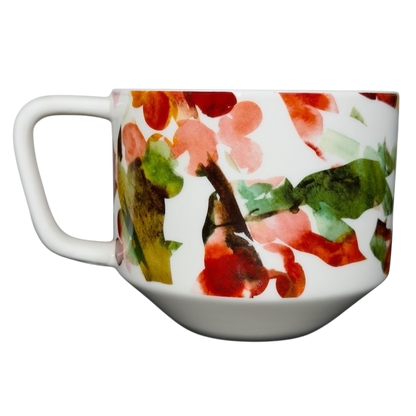 Starbucks Artisan Series collectible mug featuring a colorful floral design on a sleek white base