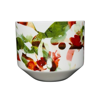 Starbucks Artisan Series collectible mug featuring a vibrant floral design in green and red hues