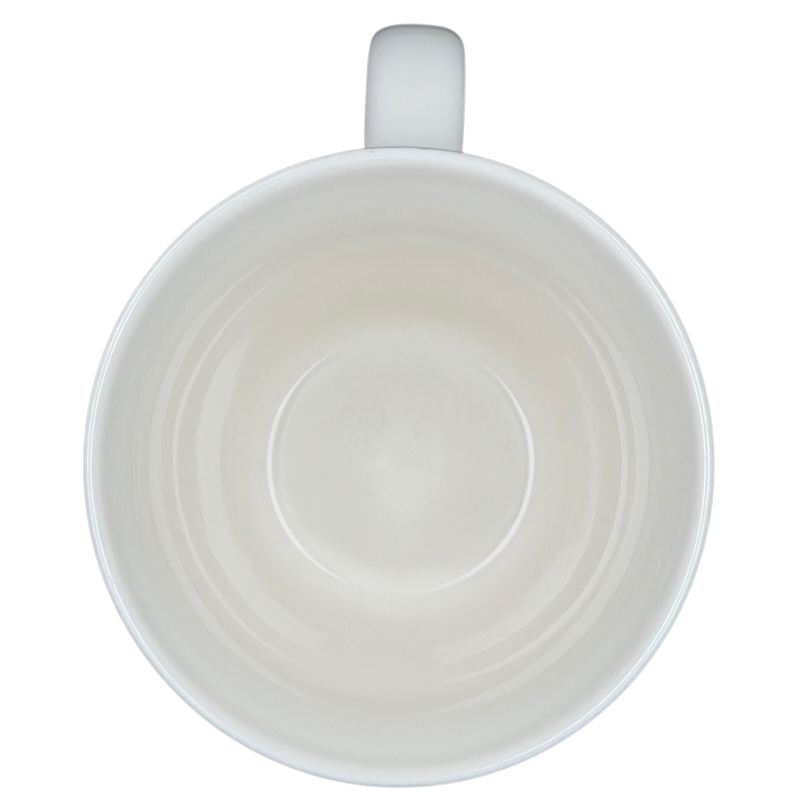 Inside view of the Starbucks Barista Abbey ESTD 1971 Mug 2001 showcasing its smooth white interior