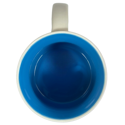 Top view of Starbucks Been There Massachusetts mug showing bright blue interior and white handle