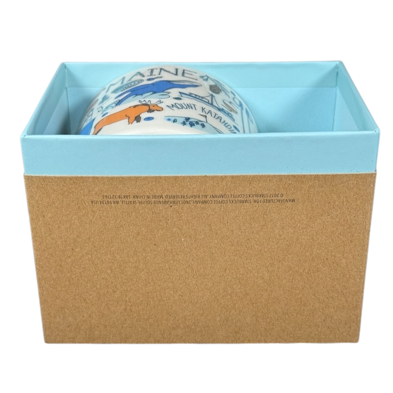 Starbucks Been There Series Maine mug partially visible inside blue and brown gift box packaging