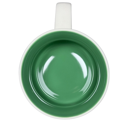 Top view of Starbucks Been There Series Montana mug with green interior and white handle