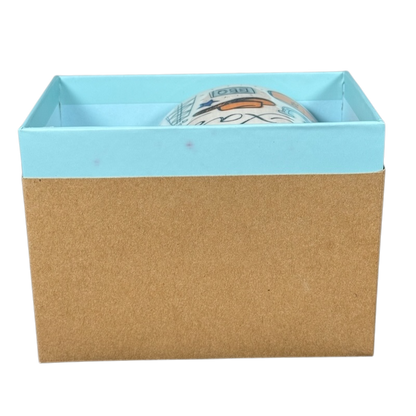 Starbucks Been There Series mug Texas partially visible inside blue and brown gift box