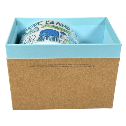 Starbucks Been There Series Rhode Island mug partially visible inside open blue and brown gift box