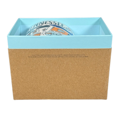 Starbucks Been There Tennessee mug partially visible inside blue and brown gift box