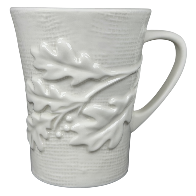 Starbucks burlap leaves acorns mug featuring a textured design and intricate leaf detailing