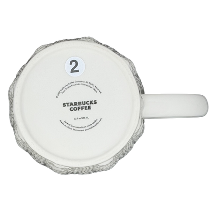 Bottom view of Starbucks cable knit mug featuring a cozy texture and classic design