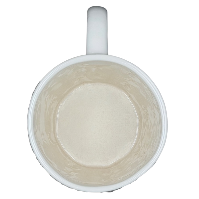 Interior view of the Starbucks cable knit mug showcasing a smooth, white ceramic finish