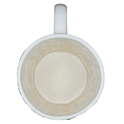 Interior view of the Starbucks cable knit mug showcasing a smooth, white ceramic finish
