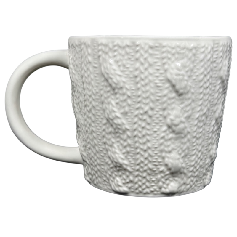 Starbucks cable knit mug in white features a textured design resembling cozy knit material