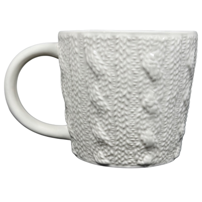 Starbucks cable knit mug in white features a textured design resembling cozy knit material