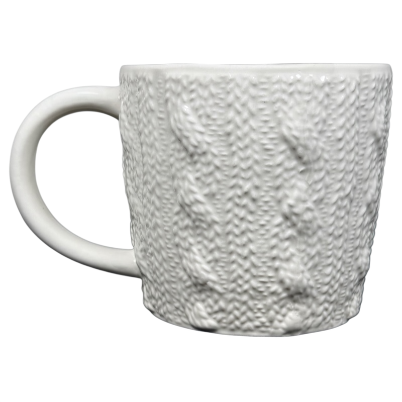 Starbucks cable knit mug in white featuring textured knit design for cozy beverages