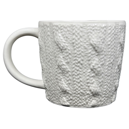 Starbucks cable knit mug in white featuring textured knit design for cozy beverages