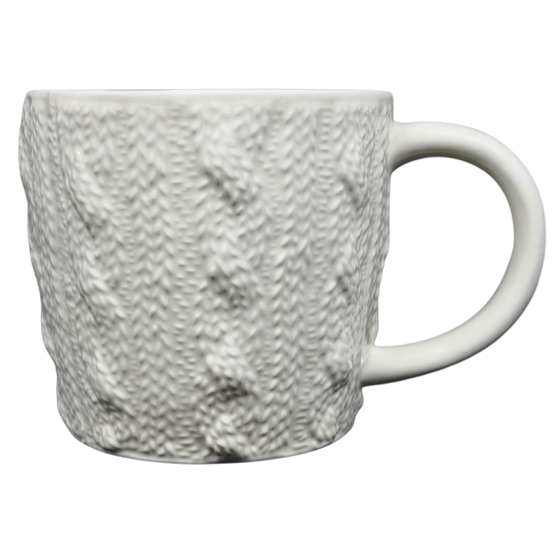 Starbucks cable knit mug in white ceramic with a textured knit pattern for cozy beverages